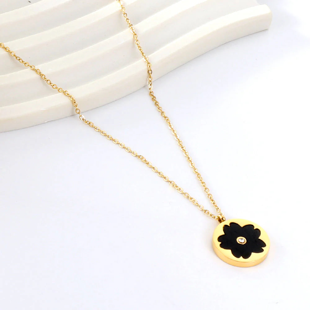 Black Blossom Gold Coin Necklace