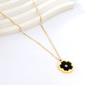 Black Blossom Gold Coin Necklace